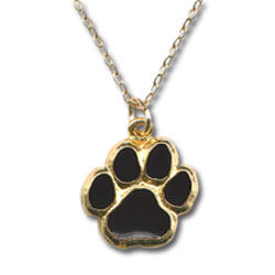 A black enamel paw print necklace on a chain, with the pendant displayed prominently.