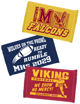 Three colored victory towels with different team logos and texts. One is yellow with 'Falcons' and a bird logo, another is blue with 'Wolves on the Prowl' and a football and date '2029', and the third is red with 'Viking' and a sword and text 'We Show No Mercy'.