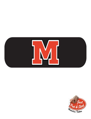 Temporary tattoo with a red letter 'M' on a black background.